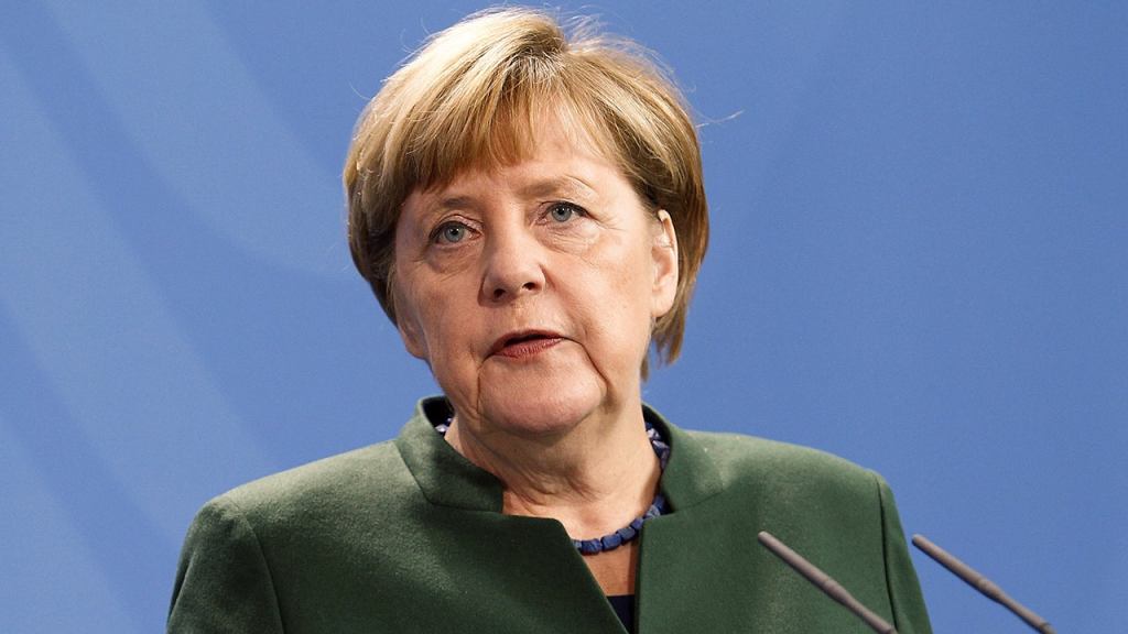 EU Honors Angela Merkel’s Tenure By Giving Her Greece