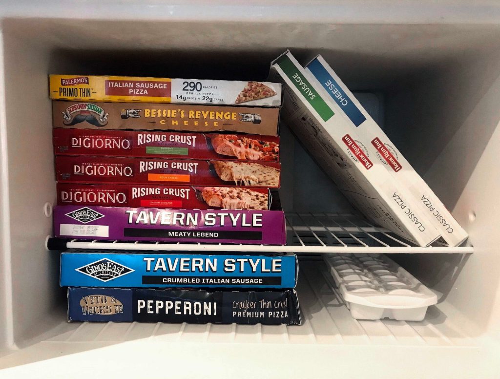 Frozen Pizza Boxes Ostentatiously Displayed By Spine Color