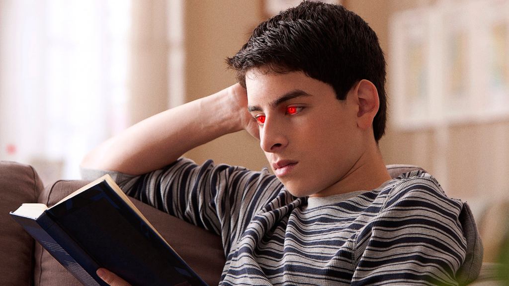 Teen’s Eyes Begin Glowing Red While Reciting Forbidden Knowledge From Book On Critical Race Theory