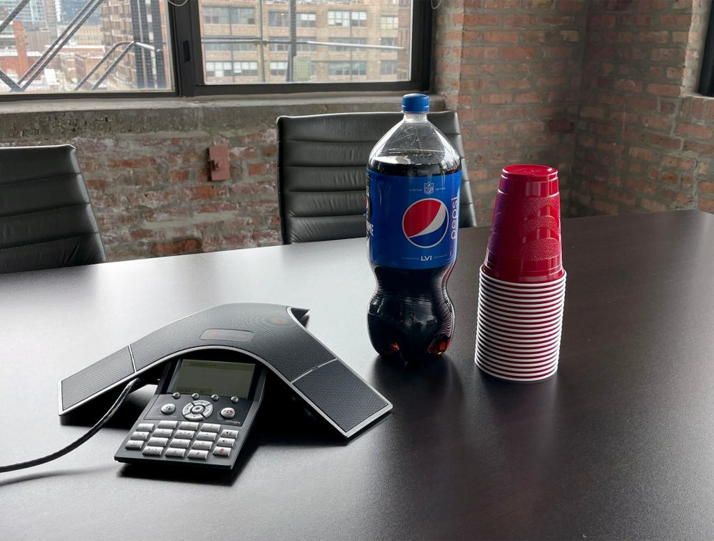 Bottle Of Pepsi Only Thing Distinguishing Office Party From Regular Staff Meeting