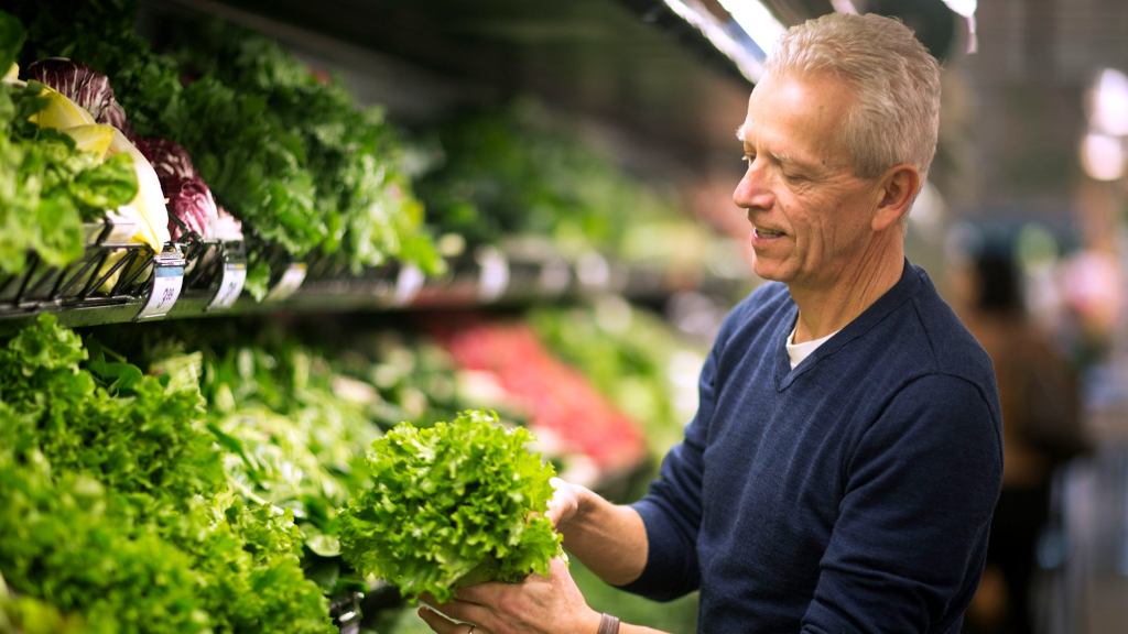 ‘I’m From Michigan, Too,’ Says Man Hitting It Off With Locally Grown Lettuce