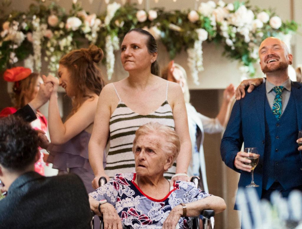 Grandma Wheeled Onto Wedding Dance Floor Given Halfhearted Spin