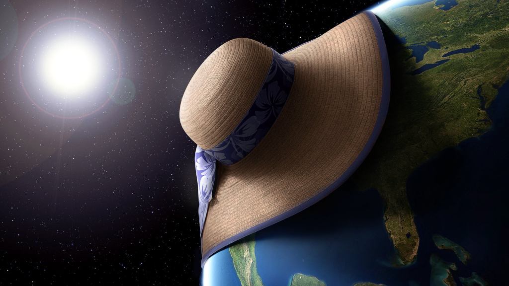 Vacationing Woman’s Big Floppy Hat Plunges Nation Into Darkness