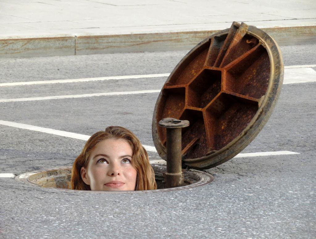 Woman Tries Meeting New People By Popping Out Different Manholes Than Usual