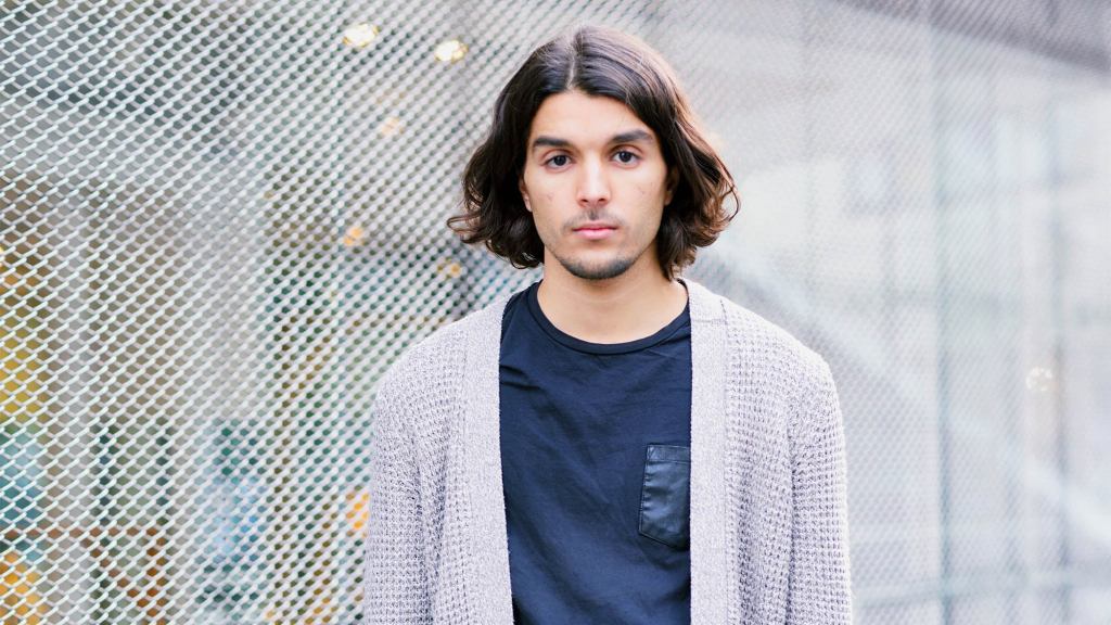 Man Hopes No One Can Tell He’s Bald Under Full Head Of Hair