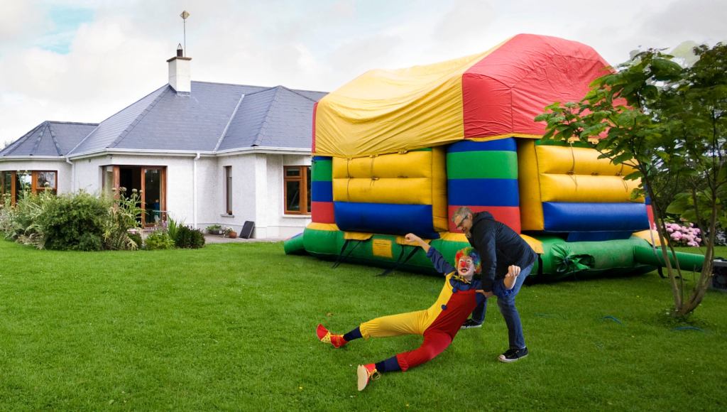 Injured Birthday Clown Taken Behind Bouncy House To Be Shot