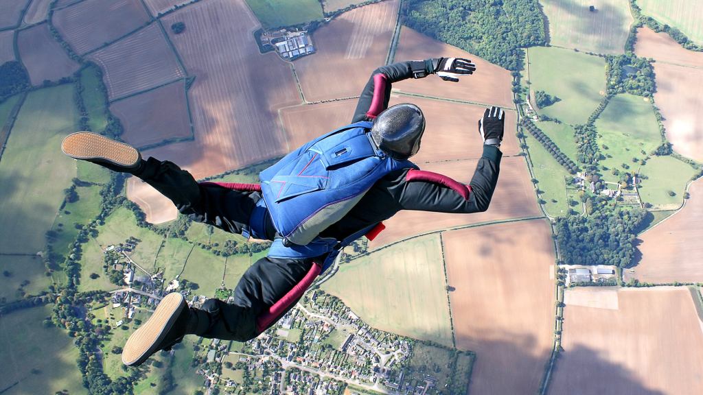 Skydiver With Malfunctioning Parachute Does One Last Scan For Trampoline