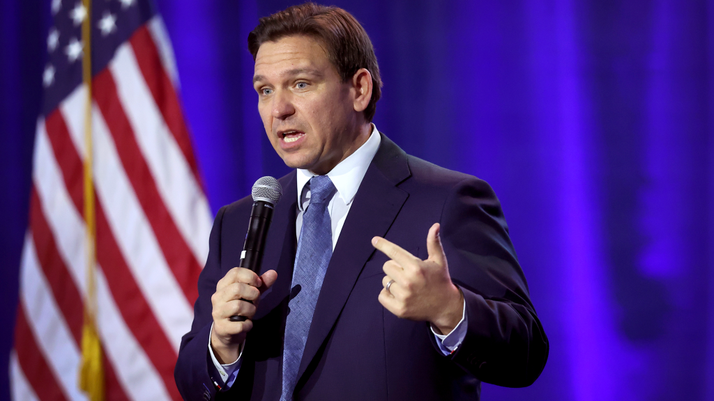 Human Rights Organization Accuses Ron DeSantis Of Subjecting Migrants To One Of His Speeches