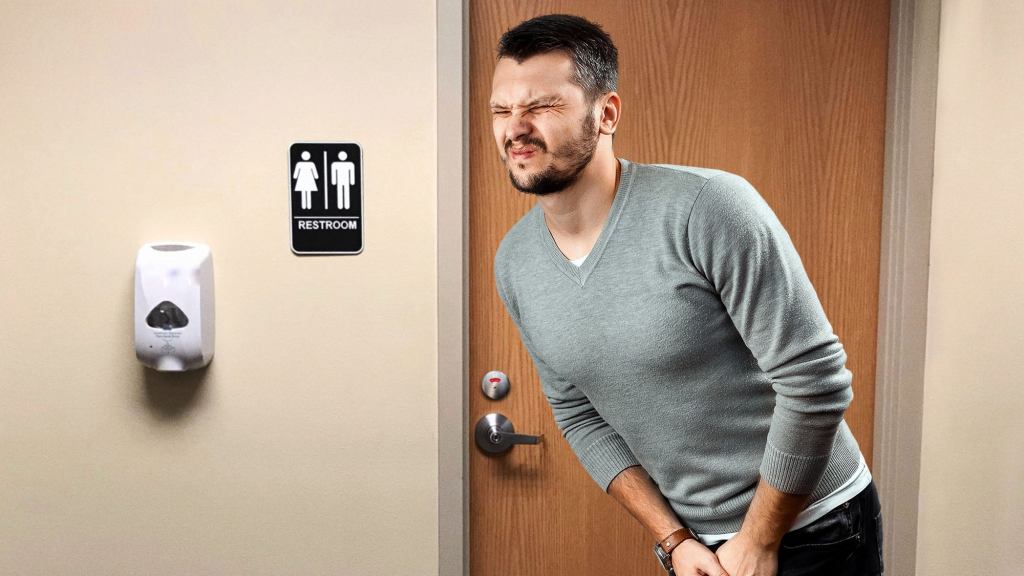 Panicked-Looking Guy Shifting Uncomfortably Outside Occupied Restroom Must Really Have To Masturbate