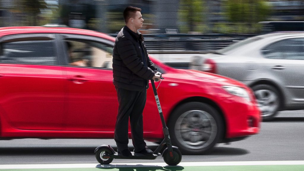 Beefy Boy On Electric Scooter Weaves Through Traffic Like Graceful Gazelle