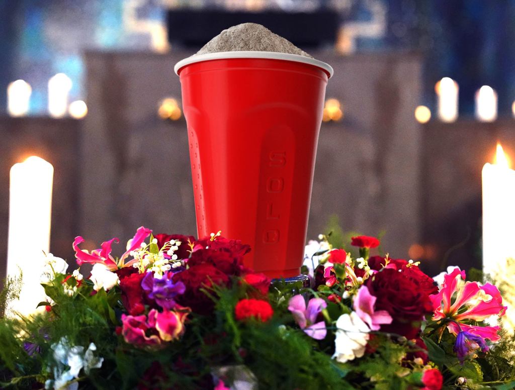 Toby Keith’s Remains Solemnly Placed In Red Solo Urn