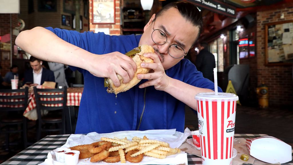 Dripping Food Strategically Held Over Other Food