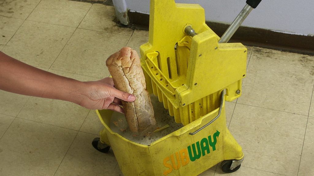 Subway Manager Shows New Hire How To Properly Soak Bread In Mop Water