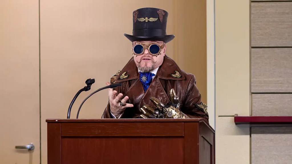 Man Wearing Steampunk Goggles At City Council Meeting Demands Designated Segway Lanes